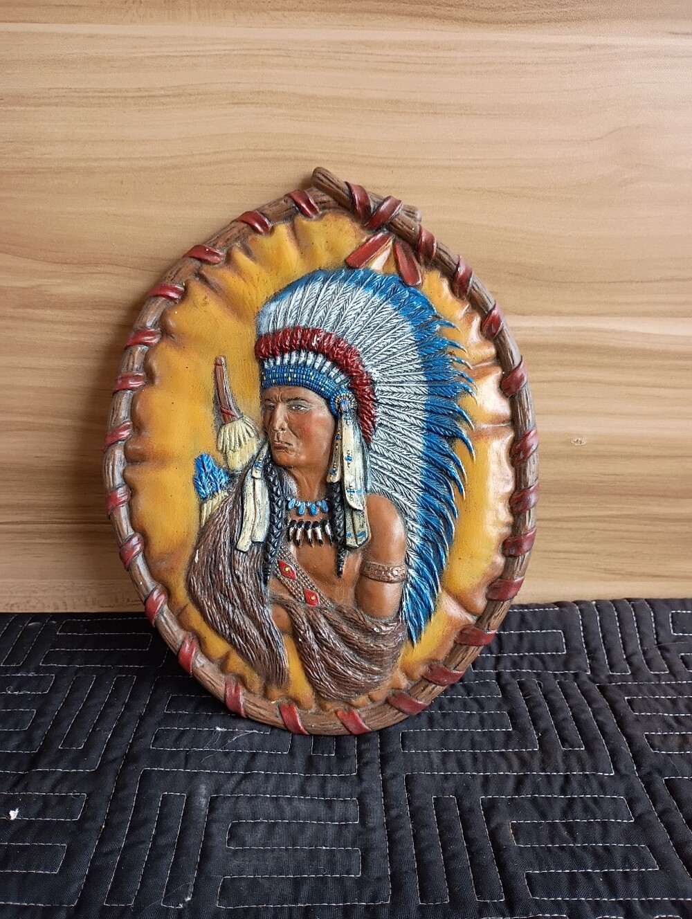Vintage ceramic slip-cast wall plaque depicting a Native American chief